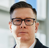 Alexander Hughes, Director Executiv al unei companii de tranzacționare crypto, portret